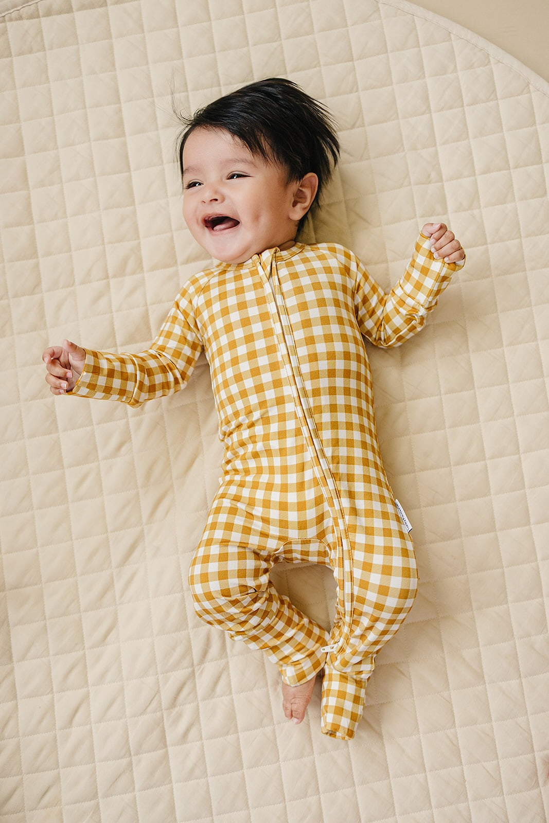 Yellow Gingham bamboo pajama set displayed with coordinating Lucky Panda Kids gingham and floral styles.