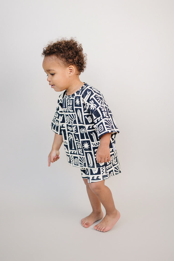 Coastal Club Cotton Shorts Set — toddler in coastal-print summer two-piece, Lucky Panda Kids
Lucky Panda Kids Coastal Club Cotton Shorts Set flat lay — Summer1 Collection
Close-up of Coastal Club Cotton Shorts Set showing coastal print and soft cotton weave
Child wearing Coastal Club Cotton Shorts Set at the beach — Lucky Panda Kids summer style
Coastal Club Cotton Shorts Set NB to 9Y — Lucky Panda Kids Summer1 Collection
