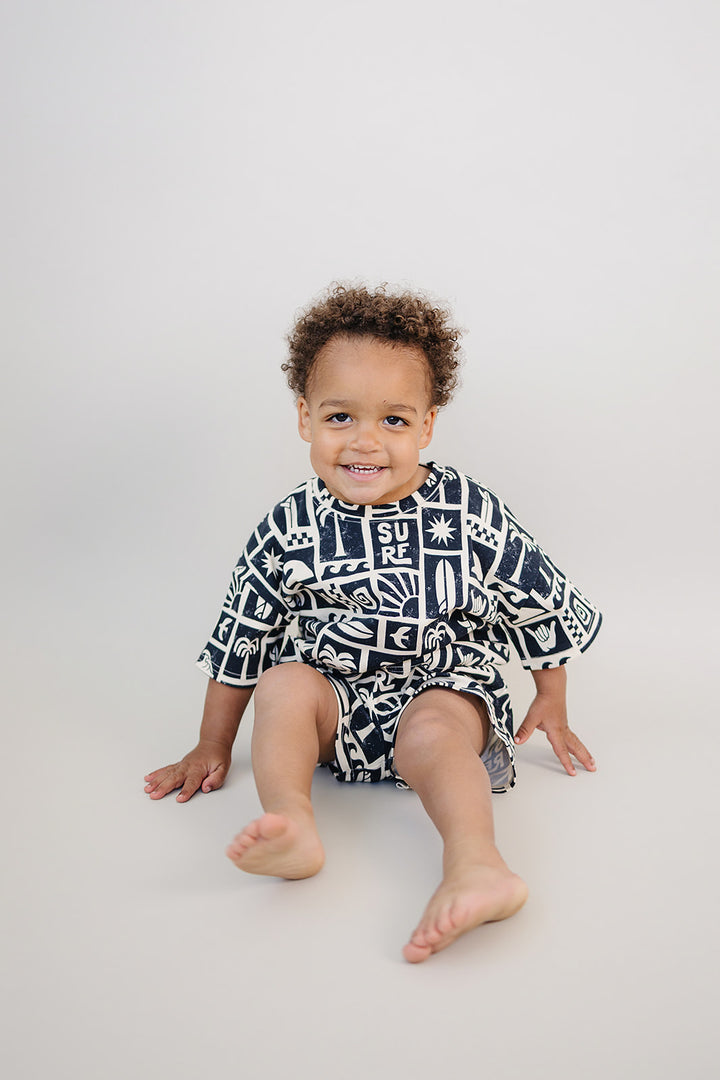 Coastal Club Cotton Shorts Set — toddler in coastal-print summer two-piece, Lucky Panda Kids
Lucky Panda Kids Coastal Club Cotton Shorts Set flat lay — Summer1 Collection
Close-up of Coastal Club Cotton Shorts Set showing coastal print and soft cotton weave
Child wearing Coastal Club Cotton Shorts Set at the beach — Lucky Panda Kids summer style
Coastal Club Cotton Shorts Set NB to 9Y — Lucky Panda Kids Summer1 Collection
