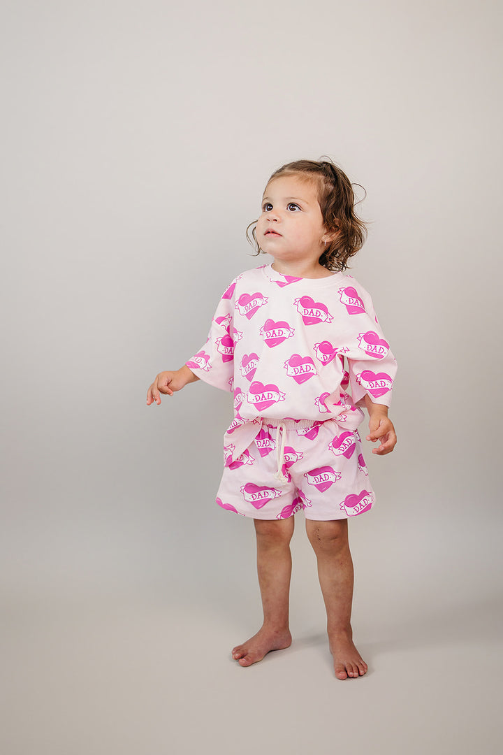Daddy's Girl Cotton Shorts Set — toddler girl in sweet summer two-piece outfit, Lucky Panda Kids Daddy's Girl Cotton Shorts Set flat lay.Close-up of Daddy's Girl Cotton Shorts Set fabric print and soft cotton detail.Little girl wearing Daddy's Girl Cotton Shorts Set playing outdoors, sunny day.Daddy's Girl Cotton Shorts Set — Father's Day gift idea for girls NB to 9Y, Lucky Panda Kids

