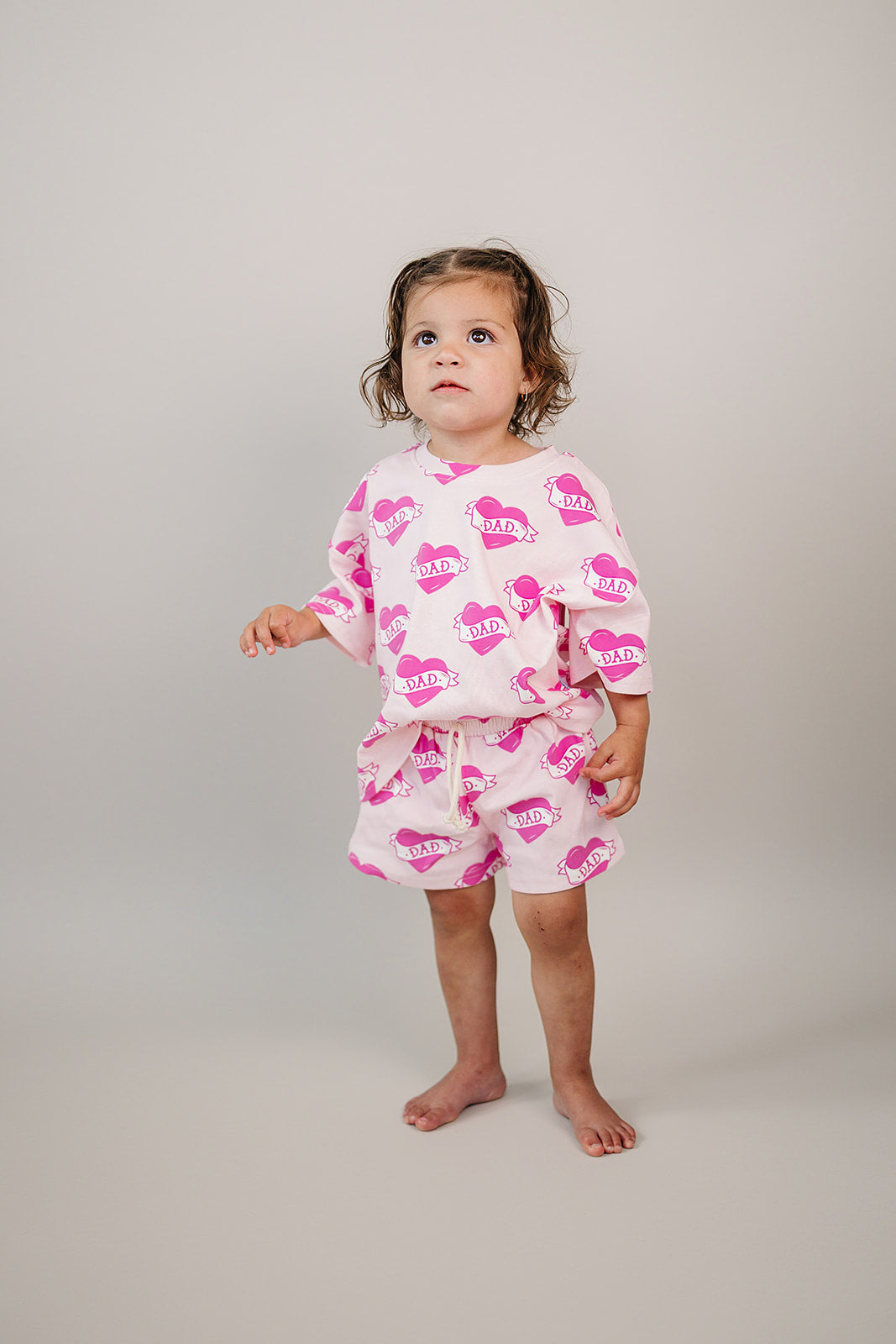 Daddy's Girl Cotton Shorts Set — toddler girl in sweet summer two-piece outfit, Lucky Panda Kids Daddy's Girl Cotton Shorts Set flat lay.Close-up of Daddy's Girl Cotton Shorts Set fabric print and soft cotton detail.Little girl wearing Daddy's Girl Cotton Shorts Set playing outdoors, sunny day.Daddy's Girl Cotton Shorts Set — Father's Day gift idea for girls NB to 9Y, Lucky Panda Kids

