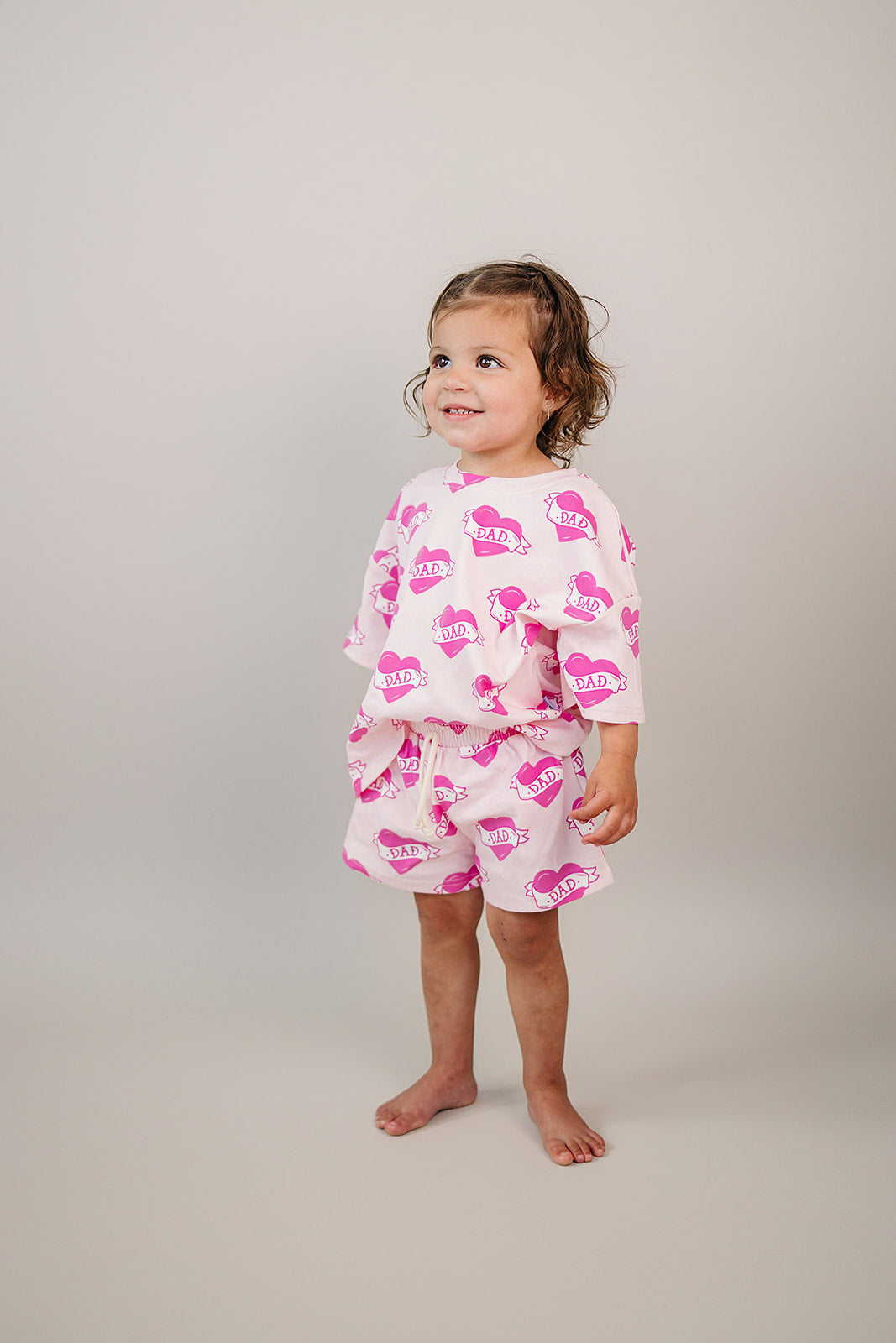 Daddy's Girl Cotton Shorts Set — toddler girl in sweet summer two-piece outfit, Lucky Panda Kids Daddy's Girl Cotton Shorts Set flat lay.Close-up of Daddy's Girl Cotton Shorts Set fabric print and soft cotton detail.Little girl wearing Daddy's Girl Cotton Shorts Set playing outdoors, sunny day.Daddy's Girl Cotton Shorts Set — Father's Day gift idea for girls NB to 9Y, Lucky Panda Kids

