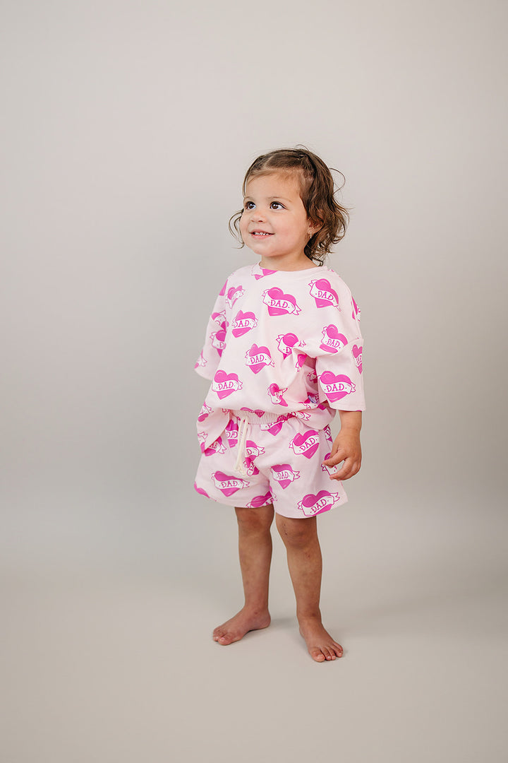 Daddy's Girl Cotton Shorts Set — toddler girl in sweet summer two-piece outfit, Lucky Panda Kids Daddy's Girl Cotton Shorts Set flat lay.Close-up of Daddy's Girl Cotton Shorts Set fabric print and soft cotton detail.Little girl wearing Daddy's Girl Cotton Shorts Set playing outdoors, sunny day.Daddy's Girl Cotton Shorts Set — Father's Day gift idea for girls NB to 9Y, Lucky Panda Kids

