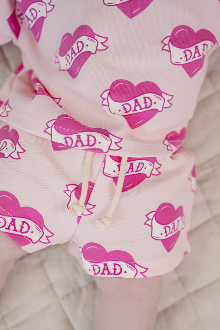 Daddy's Girl Cotton Shorts Set — toddler girl in sweet summer two-piece outfit, Lucky Panda Kids Daddy's Girl Cotton Shorts Set flat lay.Close-up of Daddy's Girl Cotton Shorts Set fabric print and soft cotton detail.Little girl wearing Daddy's Girl Cotton Shorts Set playing outdoors, sunny day.Daddy's Girl Cotton Shorts Set — Father's Day gift idea for girls NB to 9Y, Lucky Panda Kids

