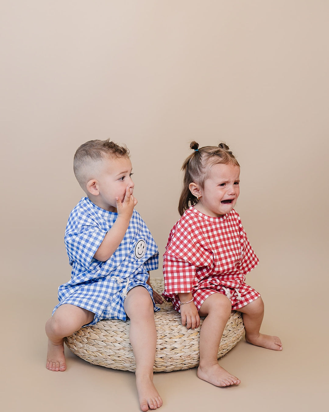 Baby wearing Lucky Panda Kids Red Gingham Shorts Set — gender neutral cotton two-piece with smiley face patch
Lucky Panda Kids Shorts Set Red Gingham flat lay — relaxed top with smiley patch and matching elastic waistband shorts
Toddler in Lucky Panda Kids Red Gingham Shorts Set — sizes 0–3M to 8–9Y, gender neutral summer outfit
Close-up of Lucky Panda Kids Red Gingham Shorts Set smiley face patch — soft 95% cotton kids two-piece
Lucky Panda Kids Red Gingham Shorts Set on baby — gender neutral cotton summer
