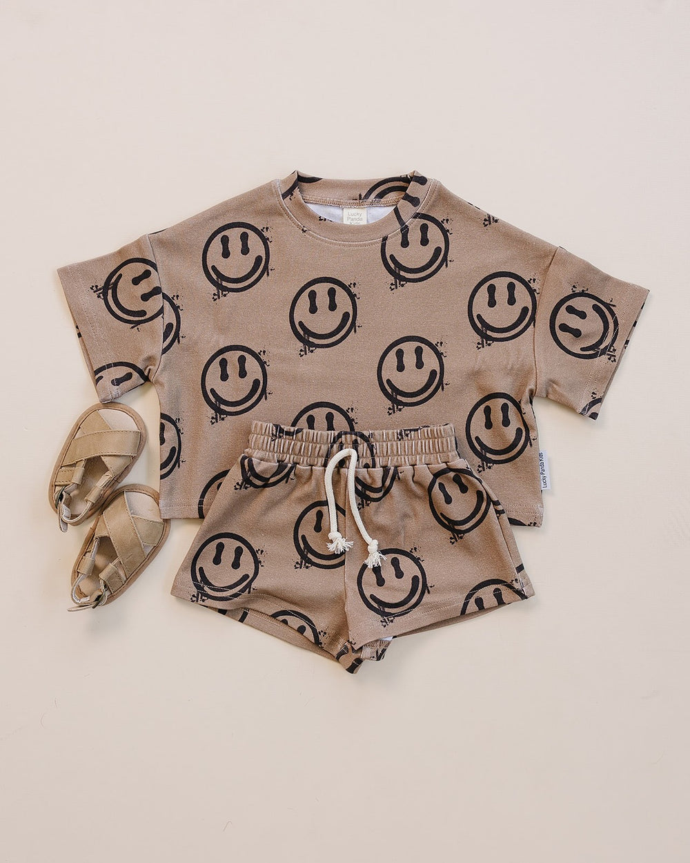Lucky Panda Kids Smiley Brown Shorts Set — warm brown all-over smiley face print cotton two-piece outfit