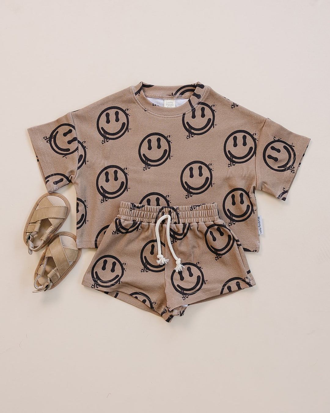 Lucky Panda Kids Smiley Brown Shorts Set — warm brown all-over smiley face print cotton two-piece outfit
