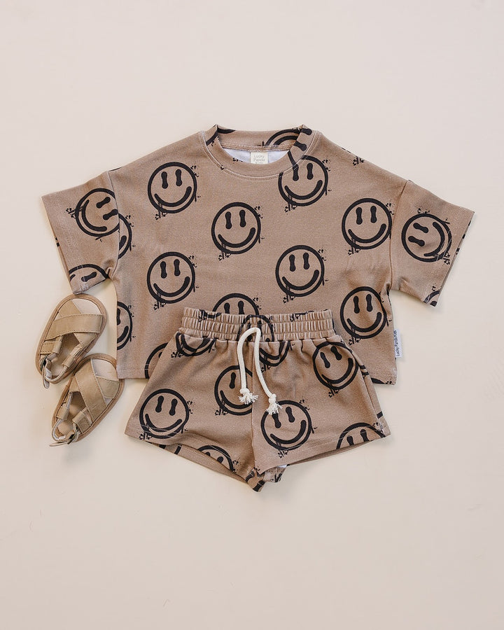 Lucky Panda Kids Smiley Brown Shorts Set — warm brown all-over smiley face print cotton two-piece outfit