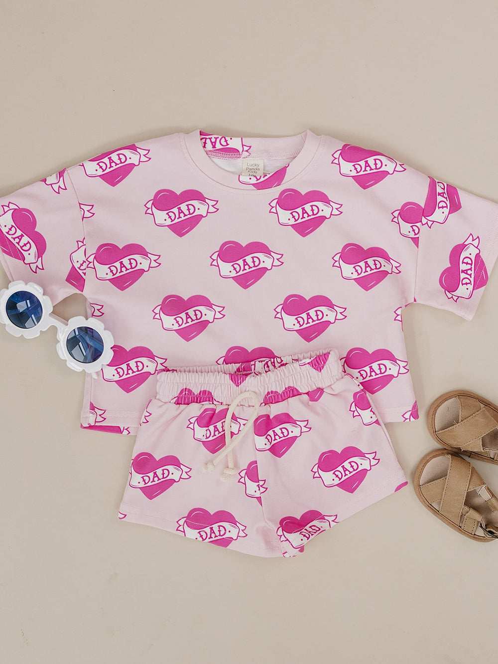 Daddy's Girl Cotton Shorts Set — toddler girl in sweet summer two-piece outfit, Lucky Panda Kids Daddy's Girl Cotton Shorts Set flat lay.Close-up of Daddy's Girl Cotton Shorts Set fabric print and soft cotton detail.Little girl wearing Daddy's Girl Cotton Shorts Set playing outdoors, sunny day.Daddy's Girl Cotton Shorts Set — Father's Day gift idea for girls NB to 9Y, Lucky Panda Kids

