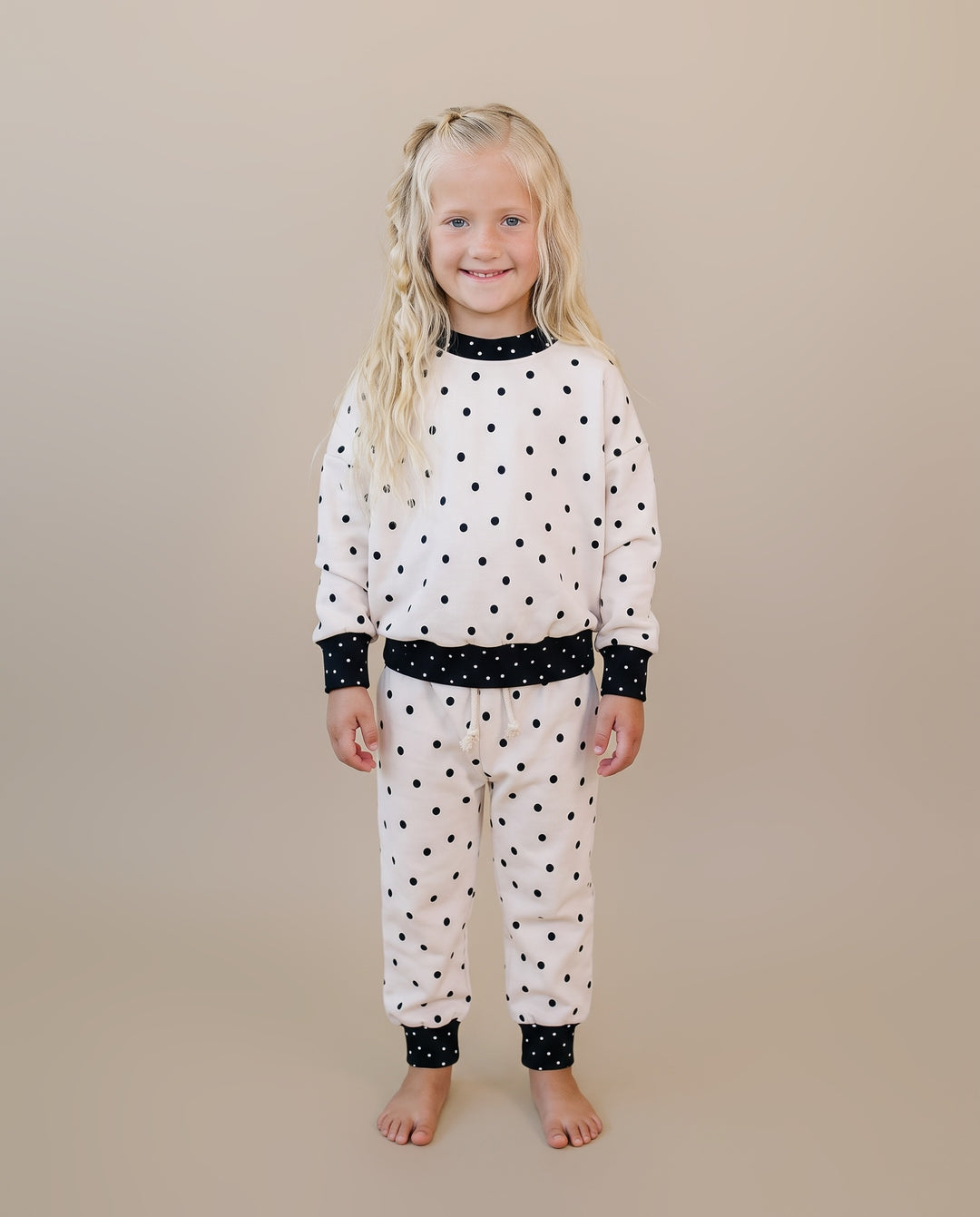 Full length view of little one wearing the Classic Polka Jogger Set