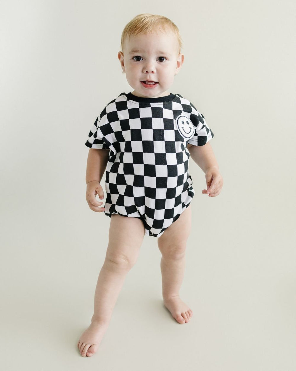 Short Sleeve Bubble Romper | Checkered Smiley Black - LUCKY PANDA KIDS