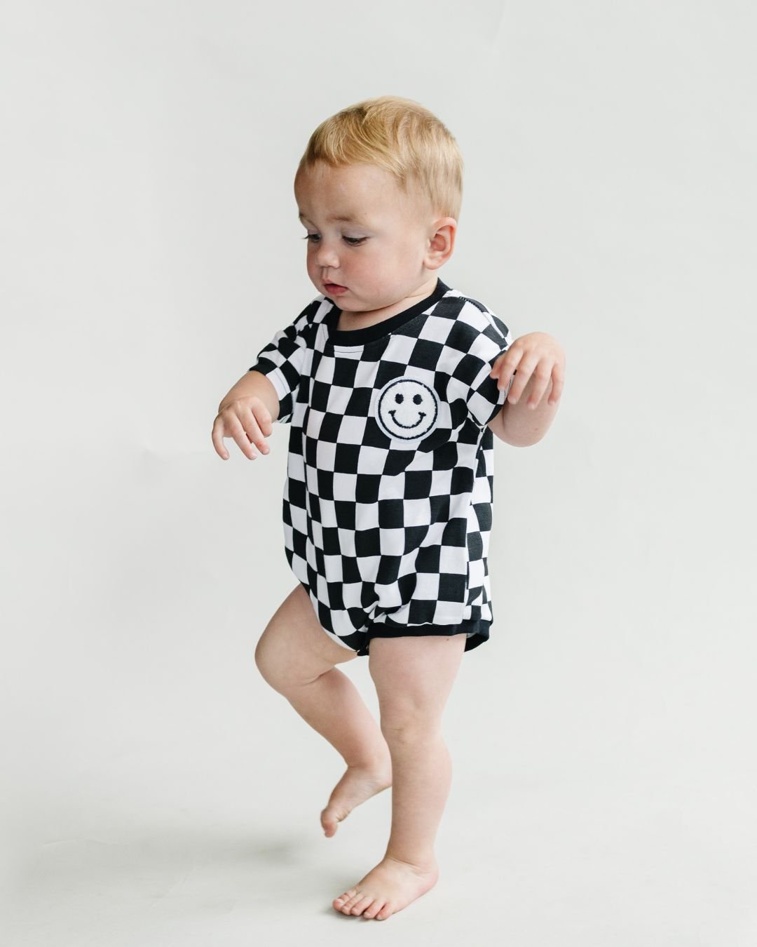 Short Sleeve Bubble Romper | Checkered Smiley Black - LUCKY PANDA KIDS