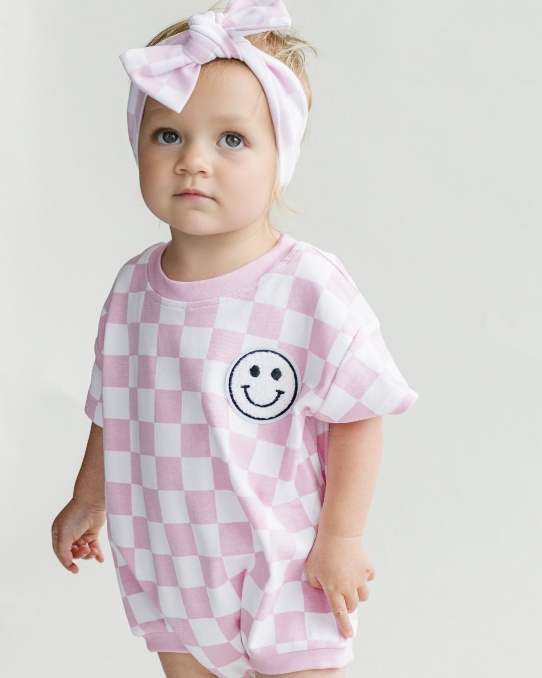 Short Sleeve Bubble Romper | Checkered Smiley Pink - LUCKY PANDA KIDS